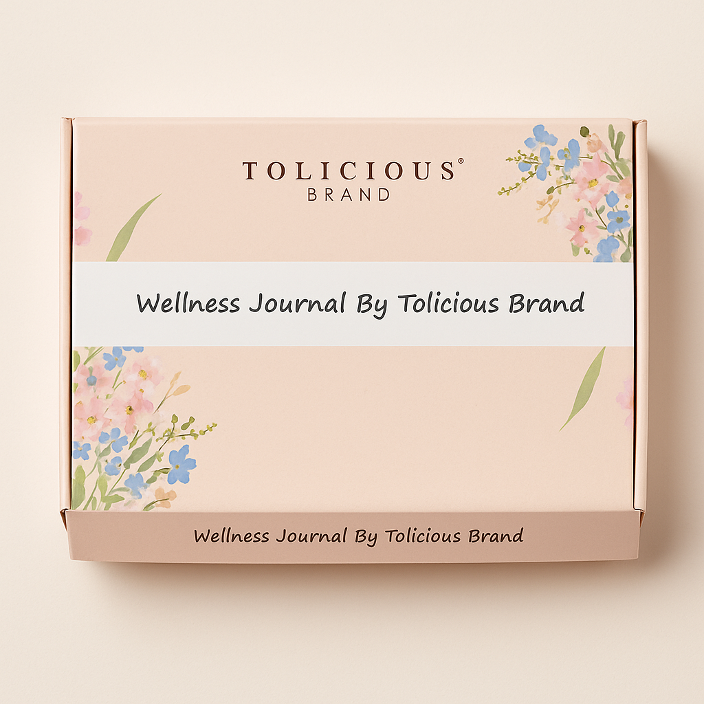 Tolicious Brand essential oil infused journal wellness box with floral design on soft pink background